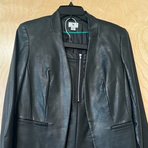 Faux leather business suit, solid black.